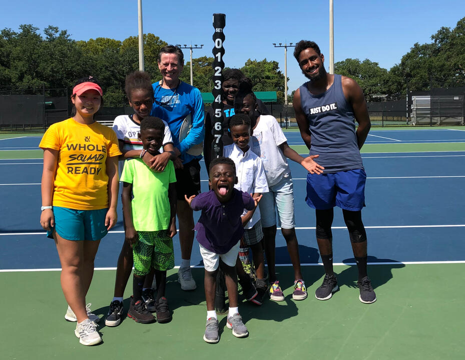 tennis player returning a serve